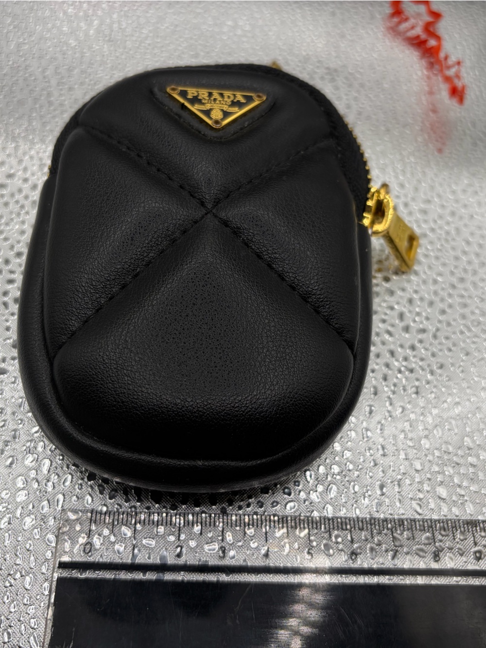 Prada Black Quilted Mini Pouch with Gold-Tone Triangle Logo